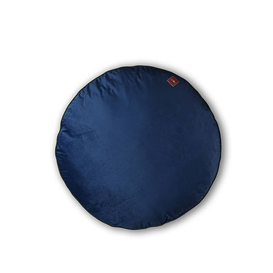 Luna Round Bed featuring soft blue velvet fabric in a circular design with cushioned comfort, ideal for pets to relax and sleep