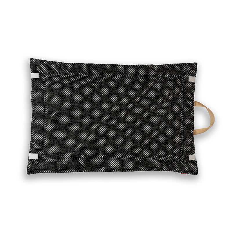 Back view of a foldable yoga mat featuring a black dotted anti-slip surface with secure grip pads and a sturdy carry handle for easy transport and storage