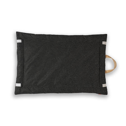 Back view of a foldable yoga mat featuring a black dotted anti-slip surface with secure grip pads and a sturdy carry handle for easy transport and storage