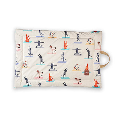 Foldable yoga mat with playful animal print and built-in carry handle, featuring soft cushioning and a lightweight design for home workouts, travel, and easy storage