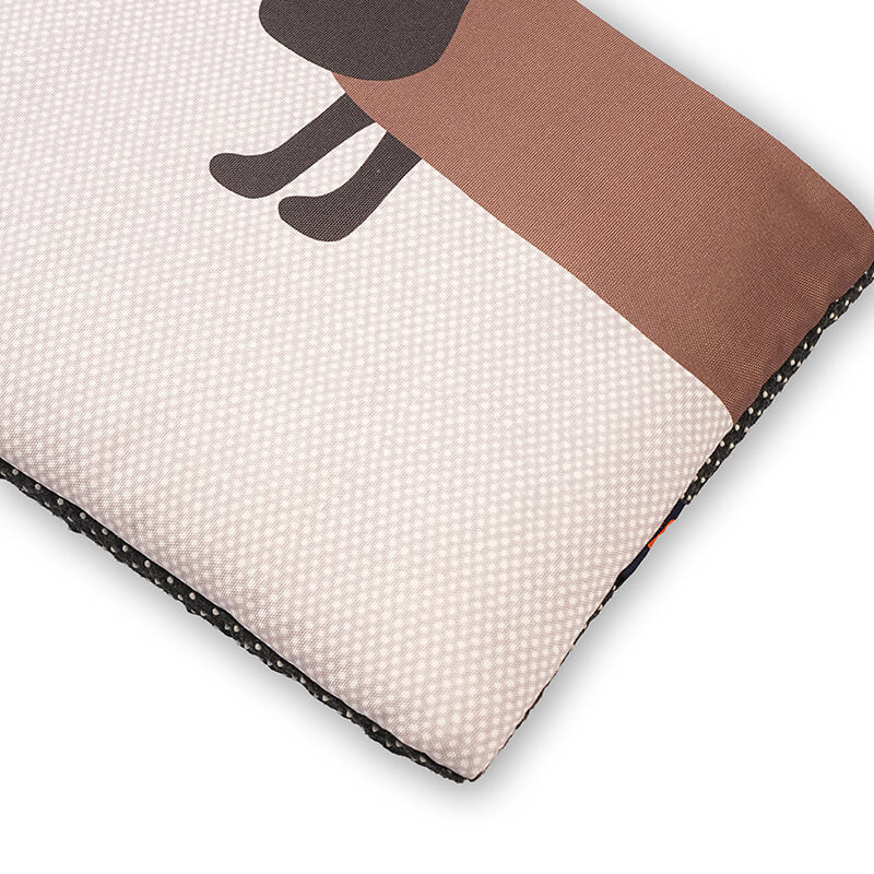 Close-up of Sniffy travel mat showing premium printed fabric, soft padding, and durable stitched edges for comfortable and secure pet resting during travel and daily use