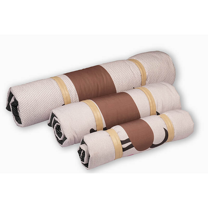 Rolled Sniffy travel mats neatly secured with straps, showcasing compact and portable design for easy carrying, storage, and travel comfort for dogs