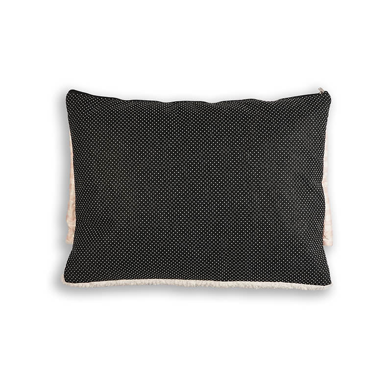 Back view of the Teddy Snug Bed showing a black anti-slip dotted base with a soft fleece edge, designed to keep the bed stable on floors while providing cozy comfort for dogs and cats.